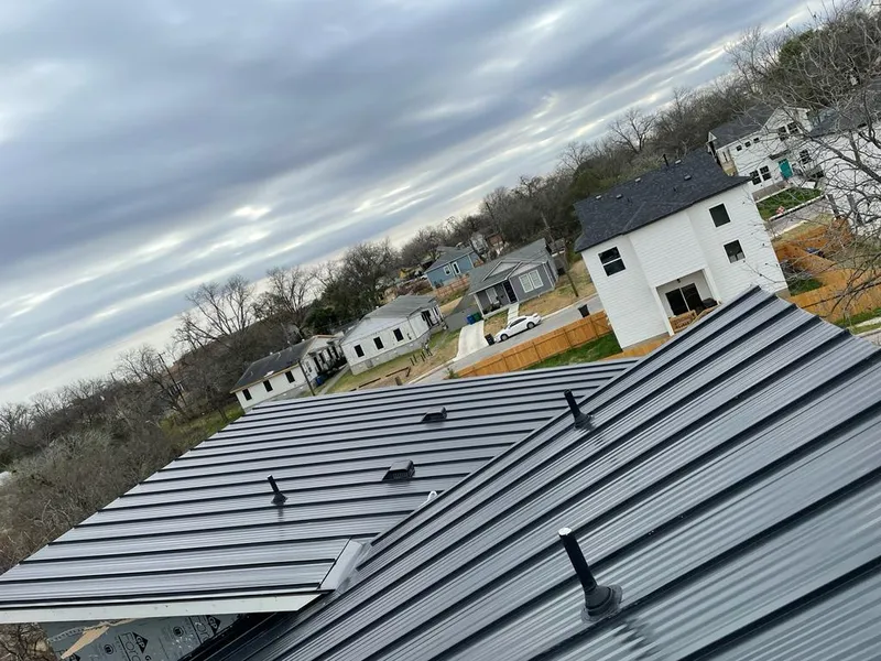 Standing seam metal roof panels with vents for Skylight Repair in Kernersville